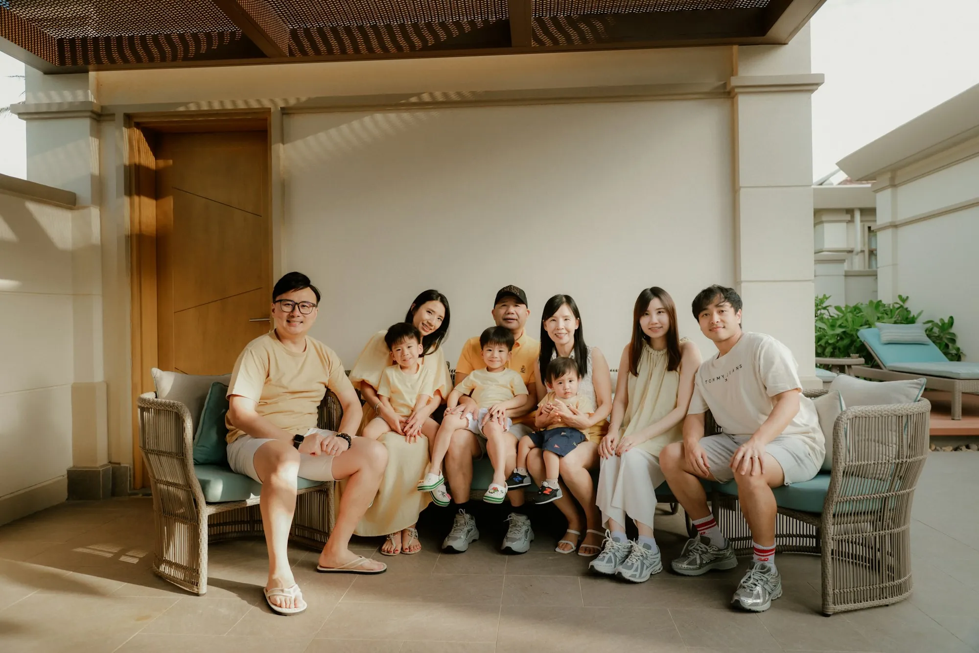 Large family gathered together in a living room